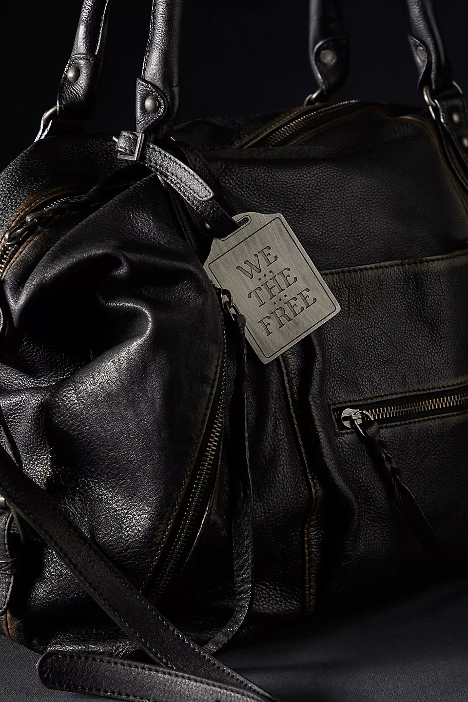 We the Free Emerson Tote Bag showcasing a spacious, simple design with sturdy handles, ideal for carrying essentials in style, Coal