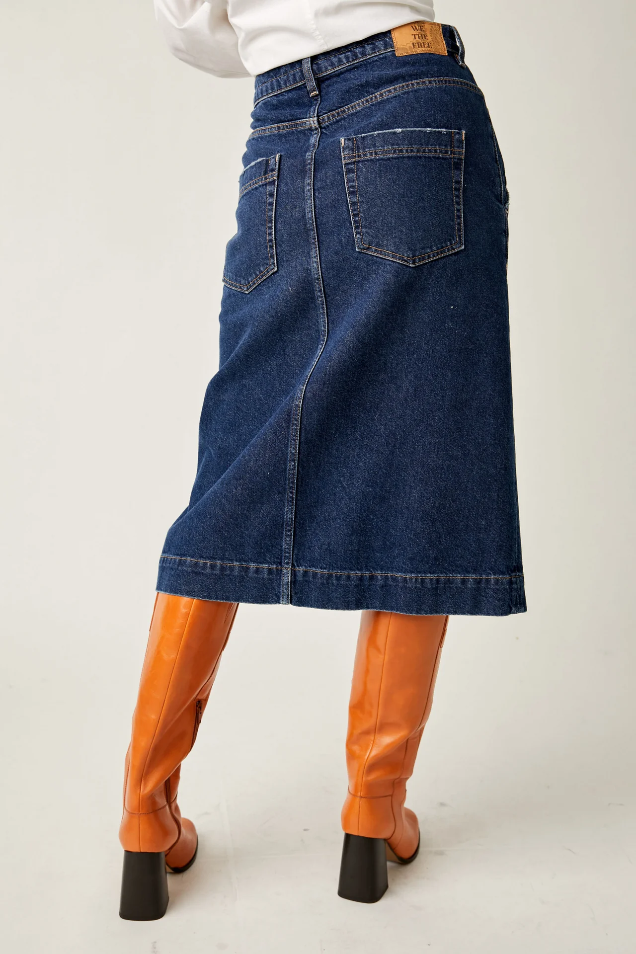 Free People Wild Roses Midi Skirt – A fitted denim midi skirt with a high waist and a sleek, straight silhouette for a modern, stylish look, Dark Indigo