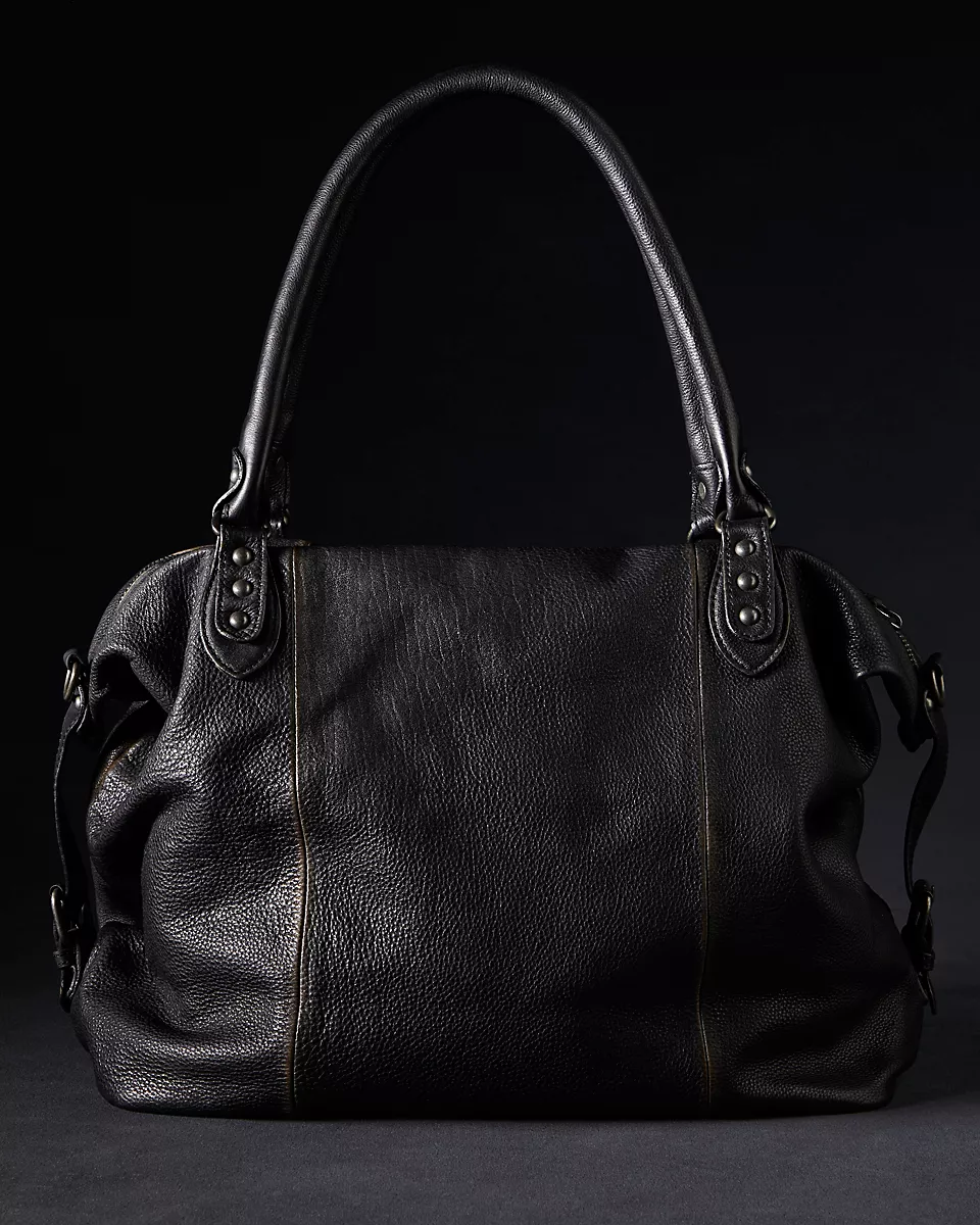 We the Free Emerson Tote Bag showcasing a spacious, simple design with sturdy handles, ideal for carrying essentials in style, Coal