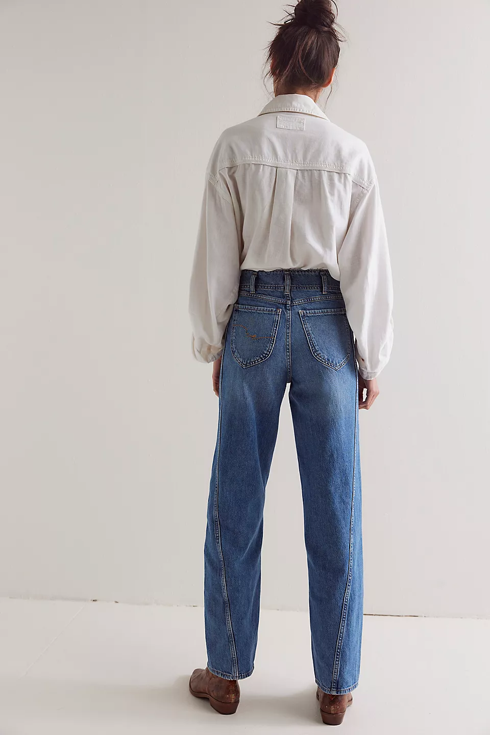 Free People Aster Straight Leg Jeans made from soft denim with a classic straight-leg fit. These jeans feature a mid-rise design, offering a comfortable and versatile look with a timeless, vintage-inspired feel, Swarm