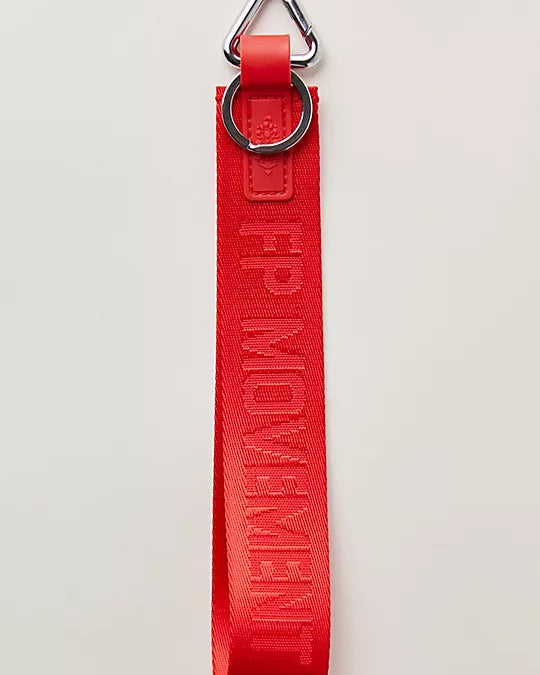 "Free People There It Is Keychain – A sporty and versatile keychain with the FP Movement logo at the center, WInterberry