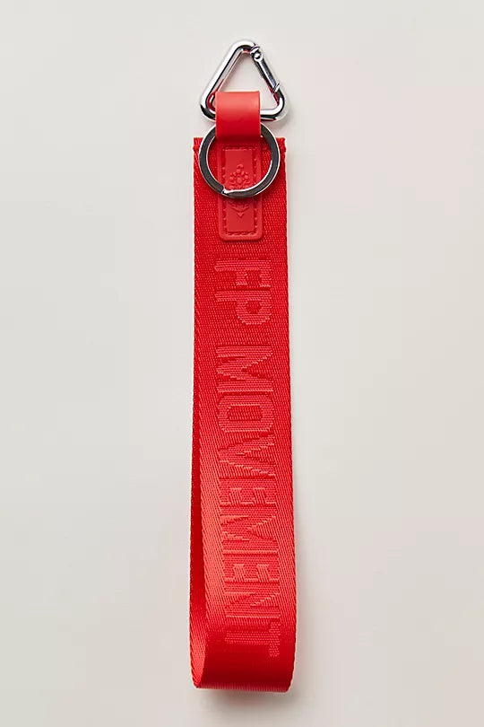 "Free People There It Is Keychain – A sporty and versatile keychain with the FP Movement logo at the center, WInterberry