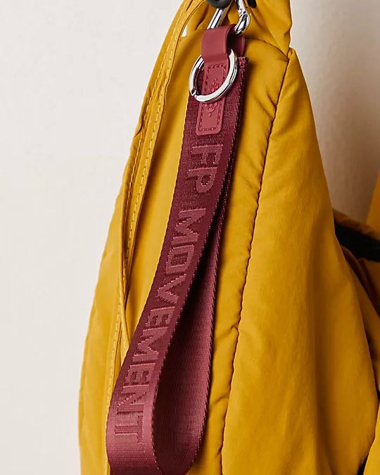 Free People There It Is Keychain – A sporty and versatile keychain with the FP Movement logo at the center, Mahogany