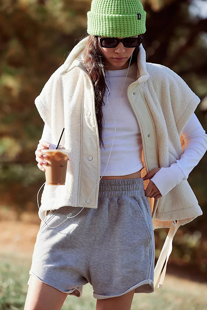 Free People Scout It Out fleece vest in a soft, textured fabric. This sleeveless, zip-up design features a high collar and cozy, relaxed fit, perfect for layering over casual outfits for added warmth and style, Birch Tree