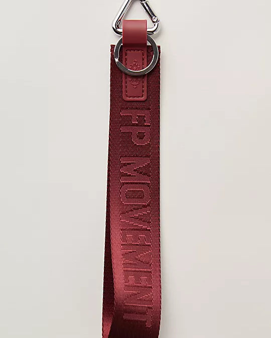 Free People There It Is Keychain – A sporty and versatile keychain with the FP Movement logo at the center, Mahogany
