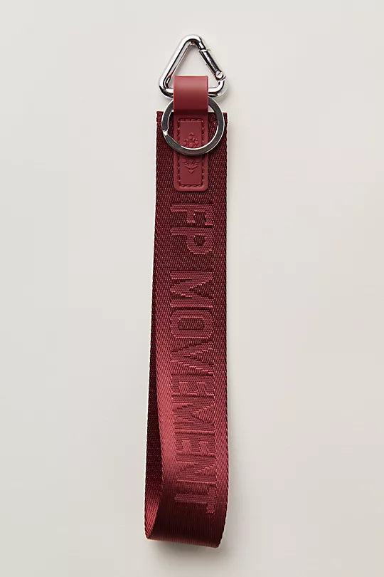Free People There It Is Keychain – A sporty and versatile keychain with the FP Movement logo at the center, Mahogany