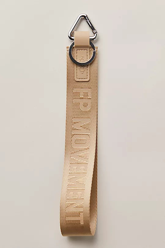 Free People There It Is Keychain – A sporty and versatile keychain with the FP Movement logo at the center, Off White