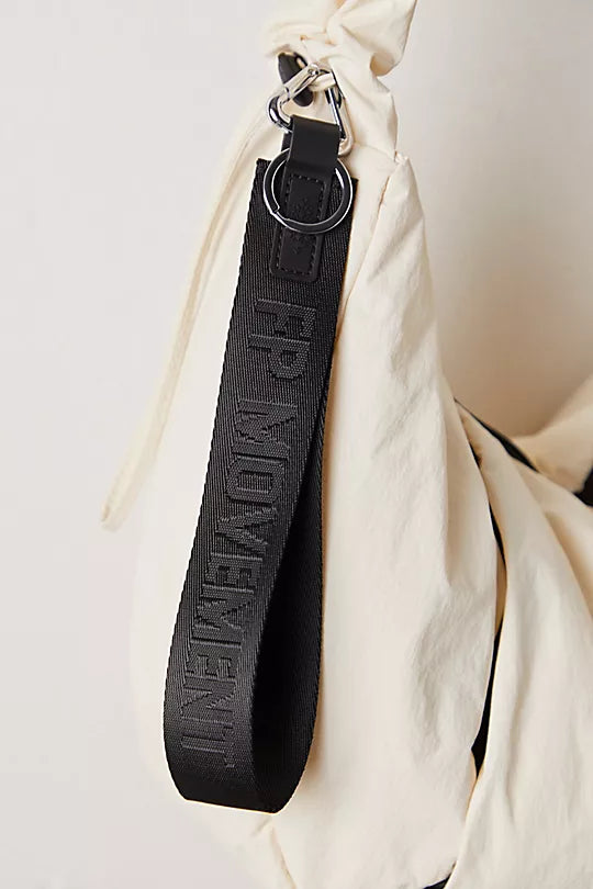 Free People There It Is Keychain – A sporty and versatile keychain with the FP Movement logo at the center, Black