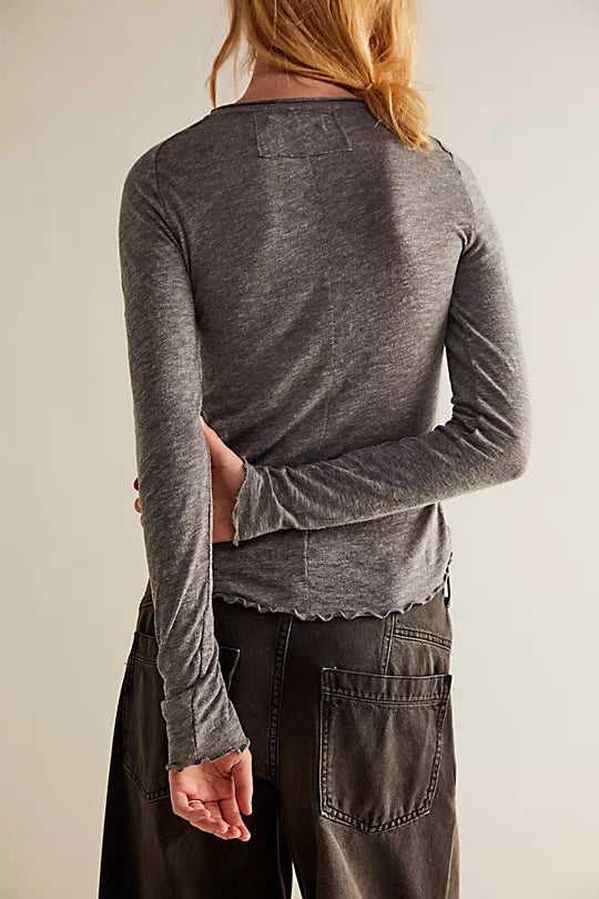 Free People Be My Baby Long Sleeve – A soft, fitted long sleeve top with a scoop neckline and smooth fabric, offering a comfortable and casual style, Heather Grey