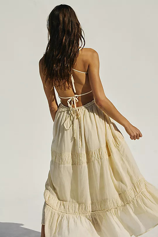 Free People Taking Sides Maxi Dress – a billowy, tiered maxi dress with a smocked bodice, front tie detail, open back, and adjustable tie-back straps, Wet Plaster