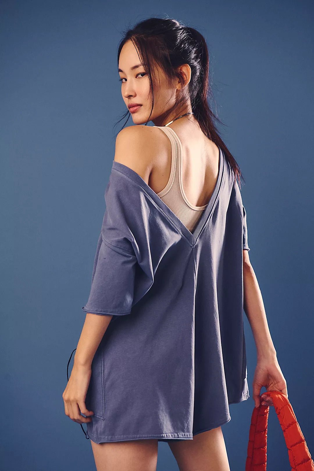 Free People Hot Shot Tee Romper made from soft, lightweight fabric with a relaxed fit. This romper features a crew neckline, short sleeves, and an easy pull-on design, offering a comfortable, laid-back style with a sporty, effortless vibe perfect for warmer days, Skyline