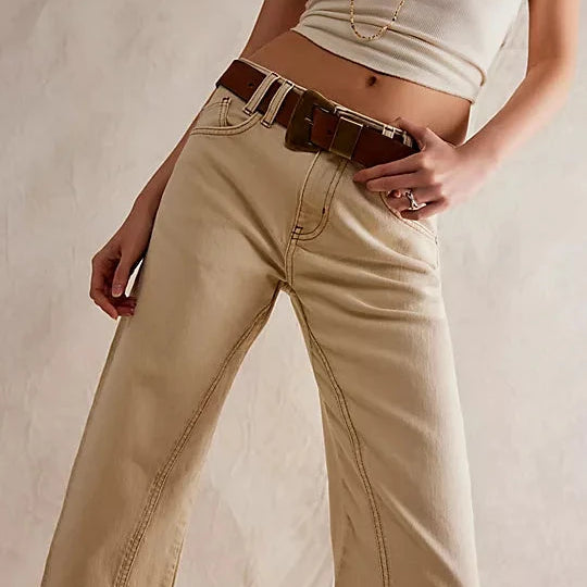 We The Free Risk Taker Mid-Rise Jeans made from soft denim with a relaxed fit and straight-leg silhouette. These jeans feature a mid-rise design, offering a casual, comfortable fit with a vintage-inspired look, Ecru