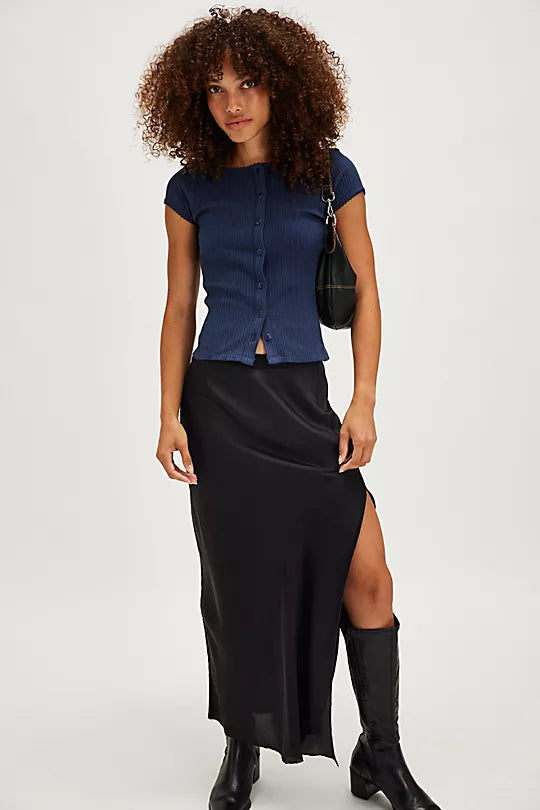 Free People Most Wanted Cardi with a form-fitting ribbed fabric, short capped sleeves, and buttons down the front, Navy
