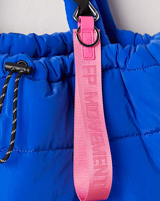 Free People There It Is Keychain – A sporty and versatile keychain with the FP Movement logo at the center, Bubble Gum