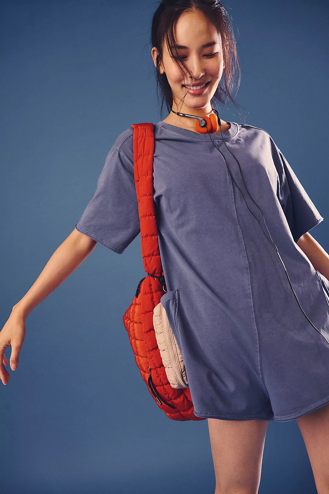 Free People Hot Shot Tee Romper made from soft, lightweight fabric with a relaxed fit. This romper features a crew neckline, short sleeves, and an easy pull-on design, offering a comfortable, laid-back style with a sporty, effortless vibe perfect for warmer days, Skyline