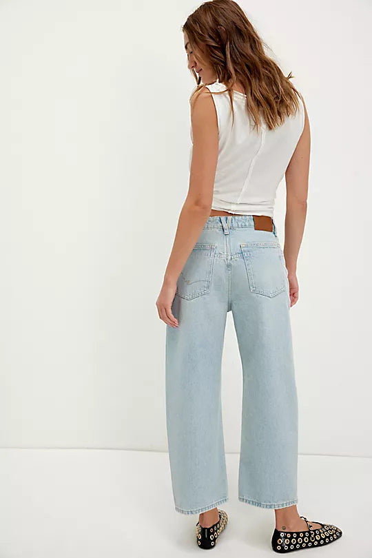 We The Free Deep Trance Dropped Boyfriend Jeans – Relaxed, slouchy jeans with a dropped waist, distressed detailing, and cuffed hems, offering a laid-back, casual look, Bleached Out