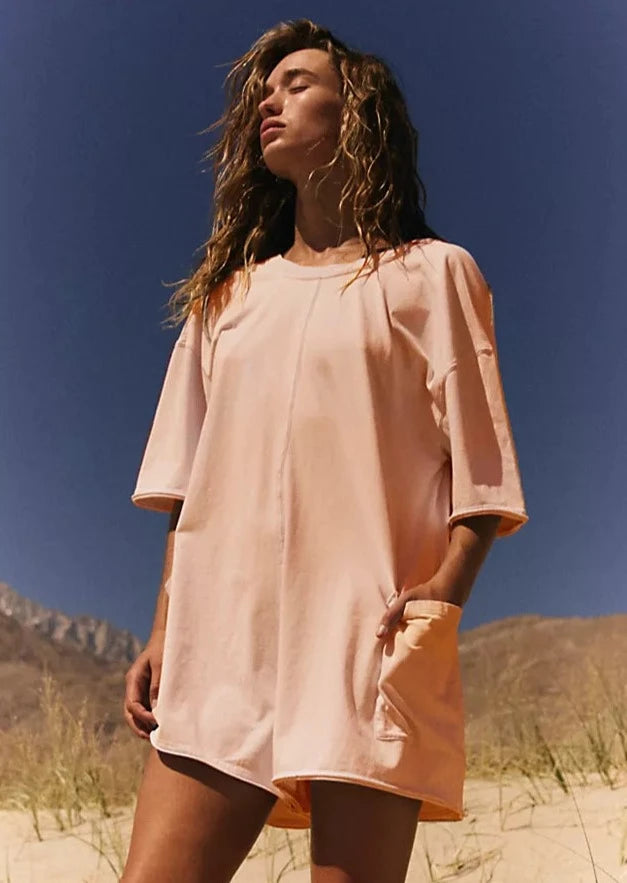 Free People Hot Shot Tee Romper made from soft, lightweight fabric with a relaxed fit. This romper features a crew neckline, short sleeves, and an easy pull-on design, offering a comfortable, laid-back style with a sporty, effortless vibe perfect for warmer days, Morning Sun