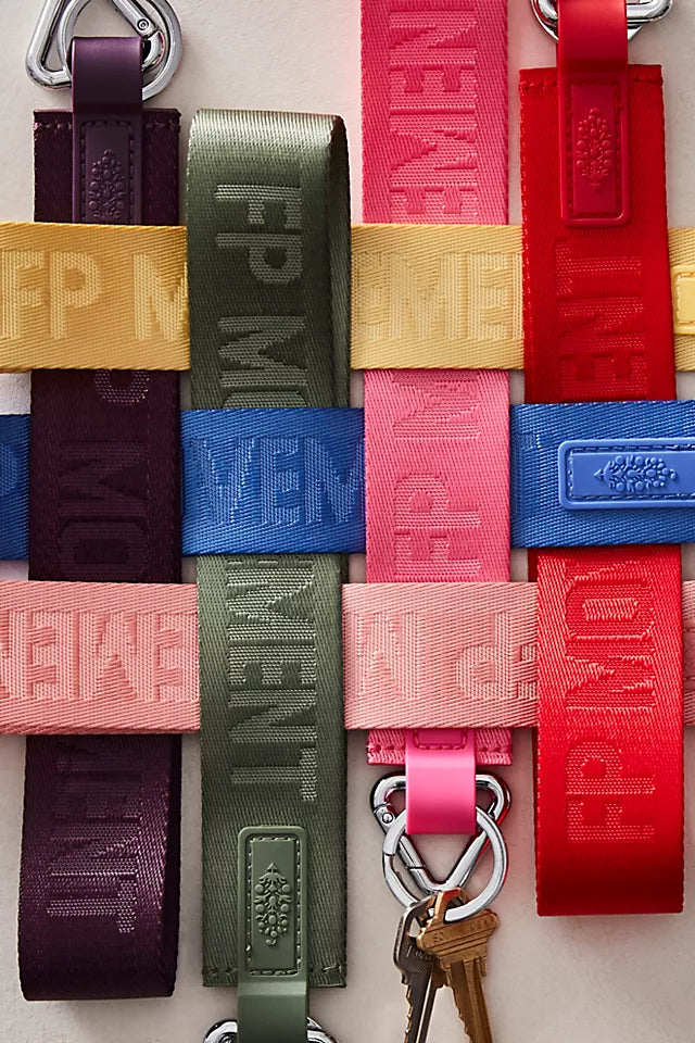 "Free People There It Is Keychain – A sporty and versatile keychain with the FP Movement logo at the center