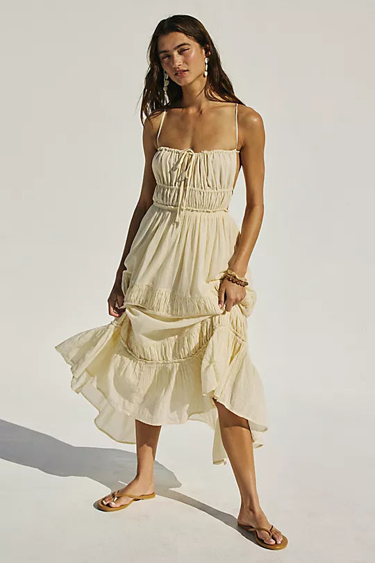 Free People Taking Sides Maxi Dress – a billowy, tiered maxi dress with a smocked bodice, front tie detail, open back, and adjustable tie-back straps, Wet Plaster