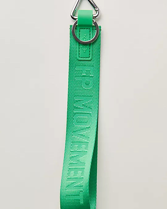 Free People There It Is Keychain – A sporty and versatile keychain with the FP Movement logo at the center, Kelly