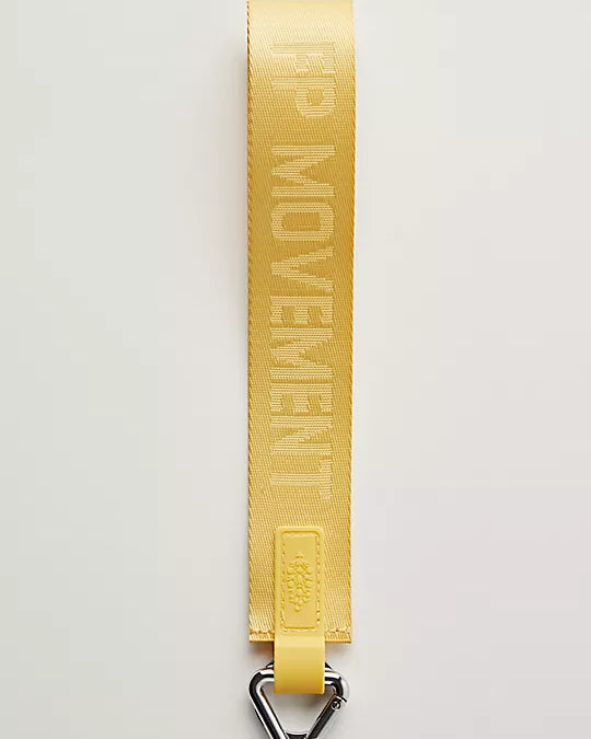 Free People There It Is Keychain – A sporty and versatile keychain with the FP Movement logo at the center, Dijon