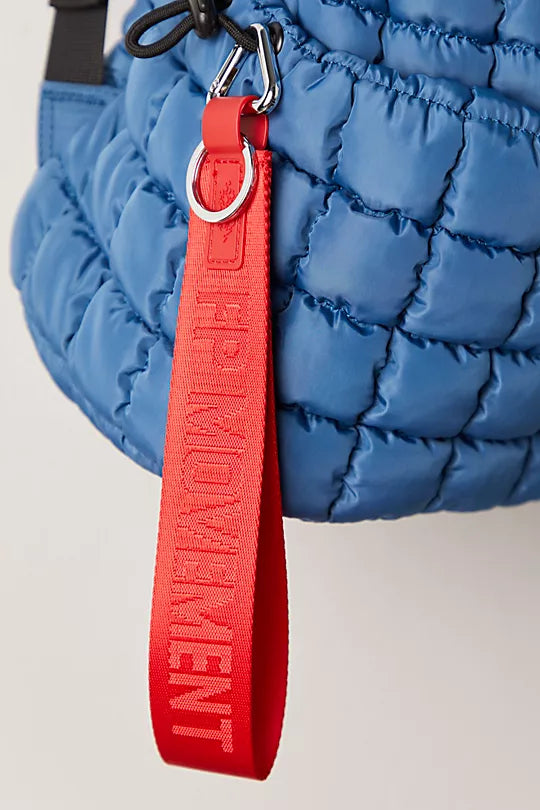 "Free People There It Is Keychain – A sporty and versatile keychain with the FP Movement logo at the center, WInterberry