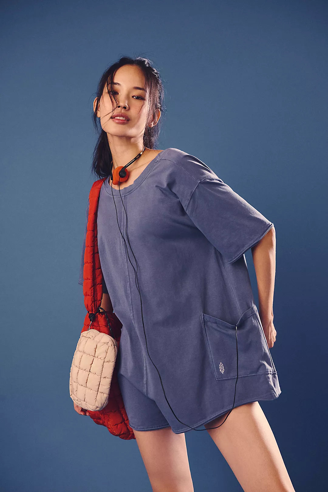 Free People Hot Shot Tee Romper made from soft, lightweight fabric with a relaxed fit. This romper features a crew neckline, short sleeves, and an easy pull-on design, offering a comfortable, laid-back style with a sporty, effortless vibe perfect for warmer days, Skyline