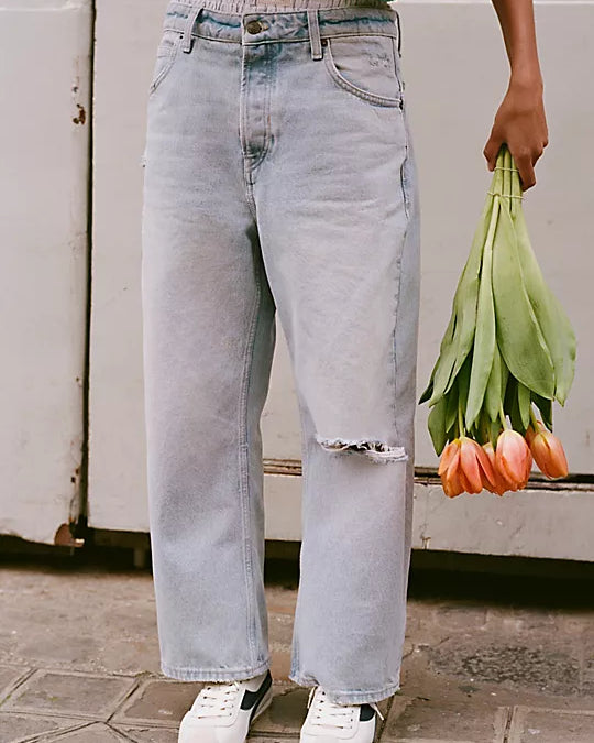 We The Free Deep Trance Dropped Boyfriend Jeans – Relaxed, slouchy jeans with a dropped waist, distressed detailing, and cuffed hems, offering a laid-back, casual look, Bleached Out
