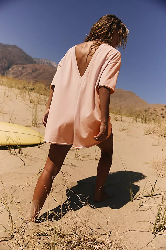Free People Hot Shot Tee Romper made from soft, lightweight fabric with a relaxed fit. This romper features a crew neckline, short sleeves, and an easy pull-on design, offering a comfortable, laid-back style with a sporty, effortless vibe perfect for warmer days, Morning Sun