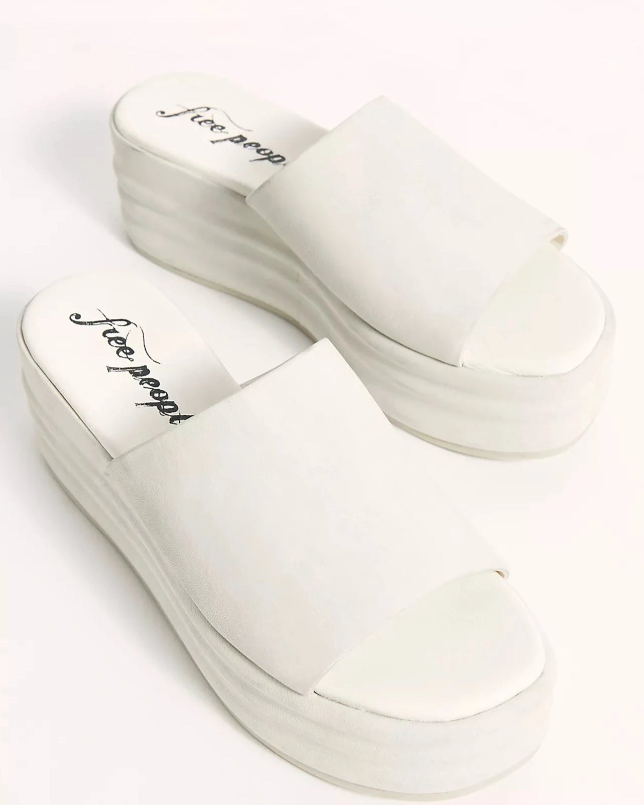 Free People Harbor Flatform Sandal – A stylish sandal with a flatform design, featuring a chunky sole and a simple, slip-on style, White