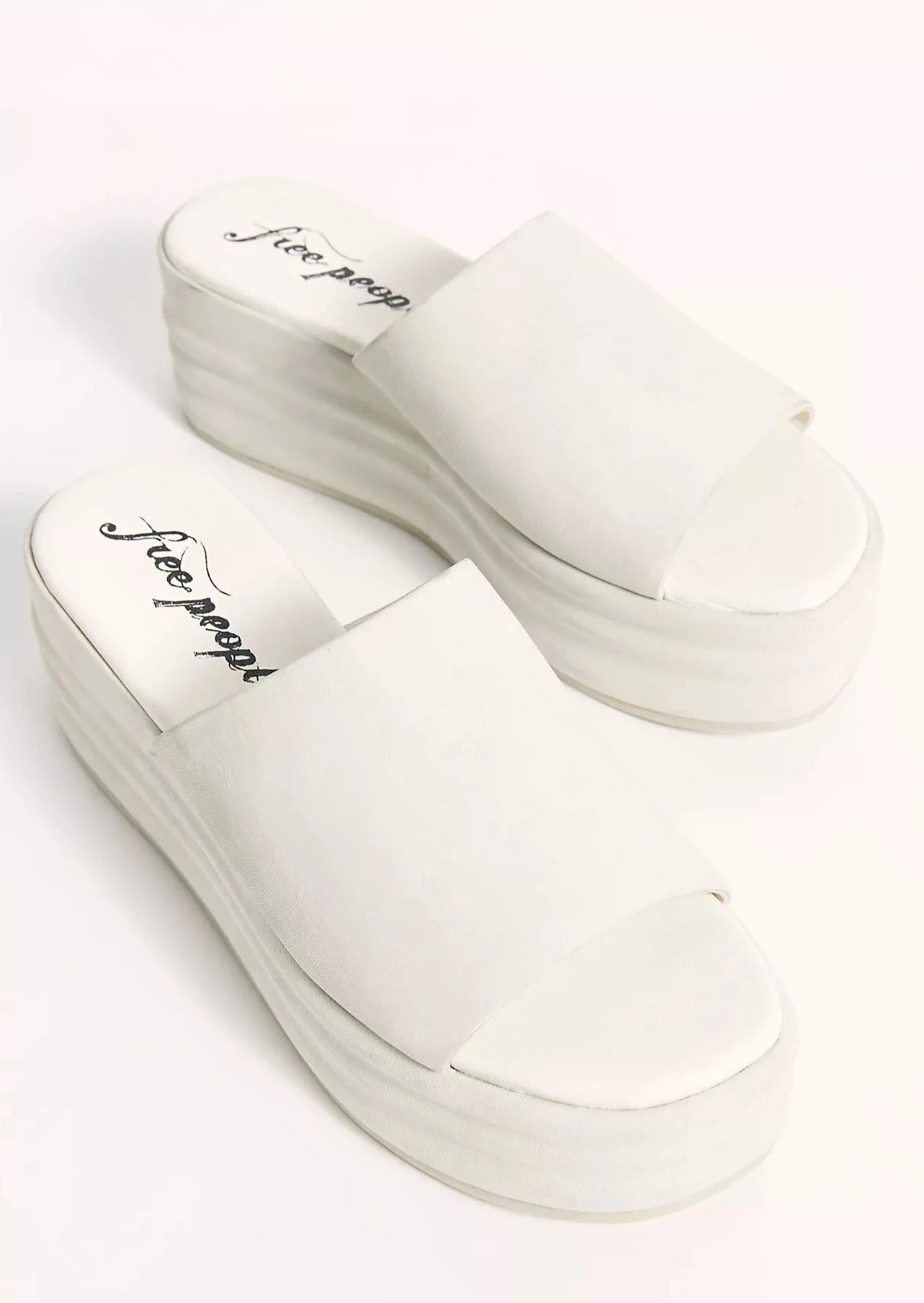 Free People Harbor Flatform Sandal – A stylish sandal with a flatform design, featuring a chunky sole and a simple, slip-on style, White