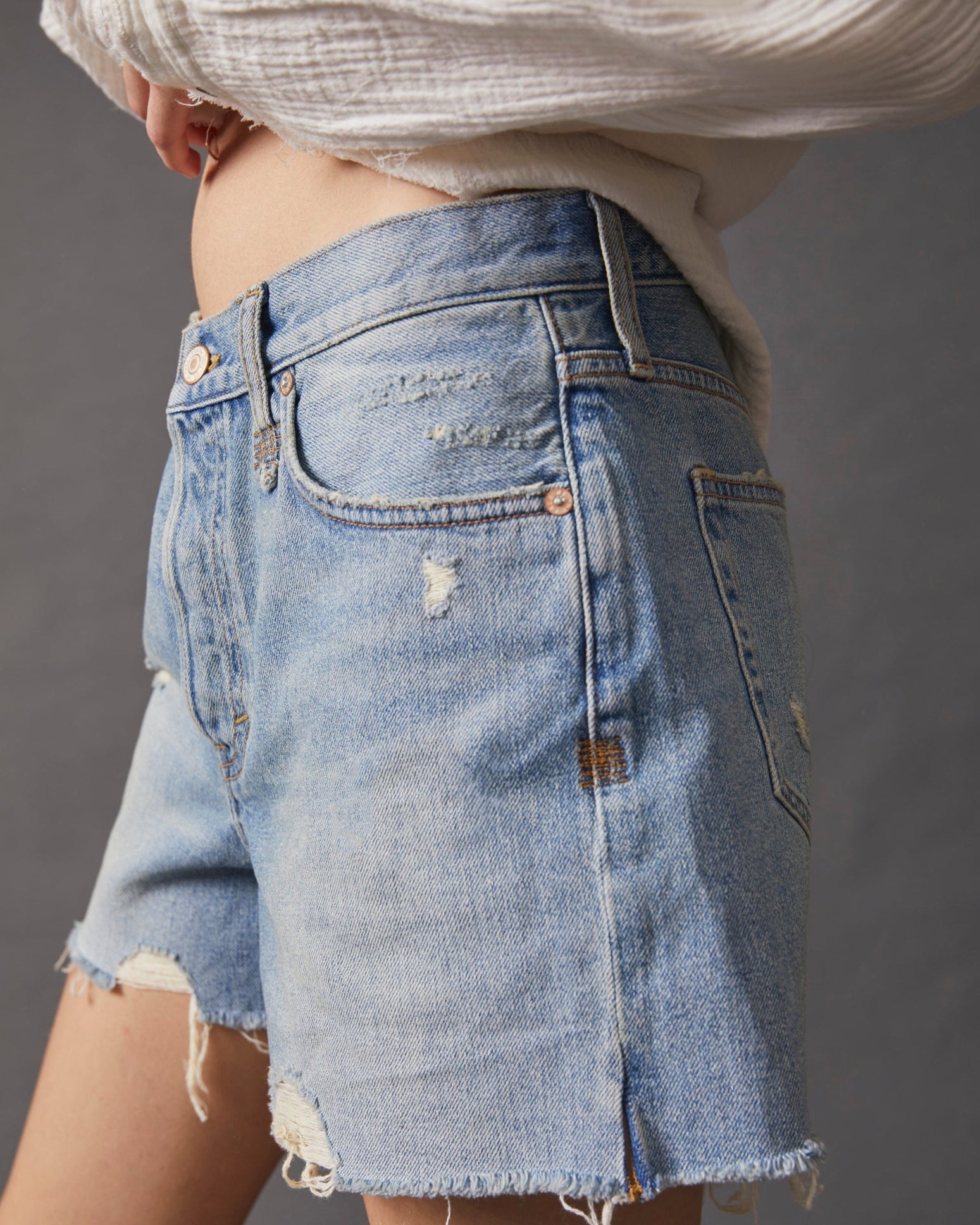 Free People Makai Cutoff Shorts – High-waisted denim shorts with a frayed hem, offering a relaxed fit and a vintage-inspired style for a casual, laid-back look, Loose Cannon