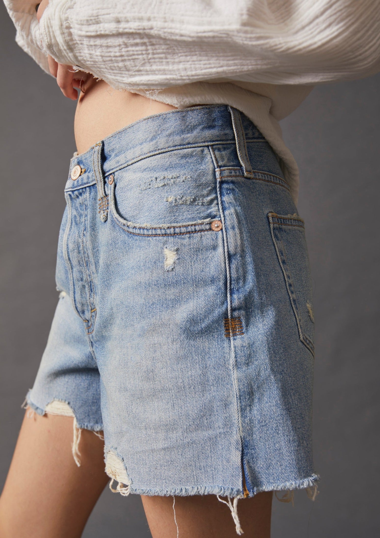 Free People Makai Cutoff Shorts – High-waisted denim shorts with a frayed hem, offering a relaxed fit and a vintage-inspired style for a casual, laid-back look, Loose Cannon