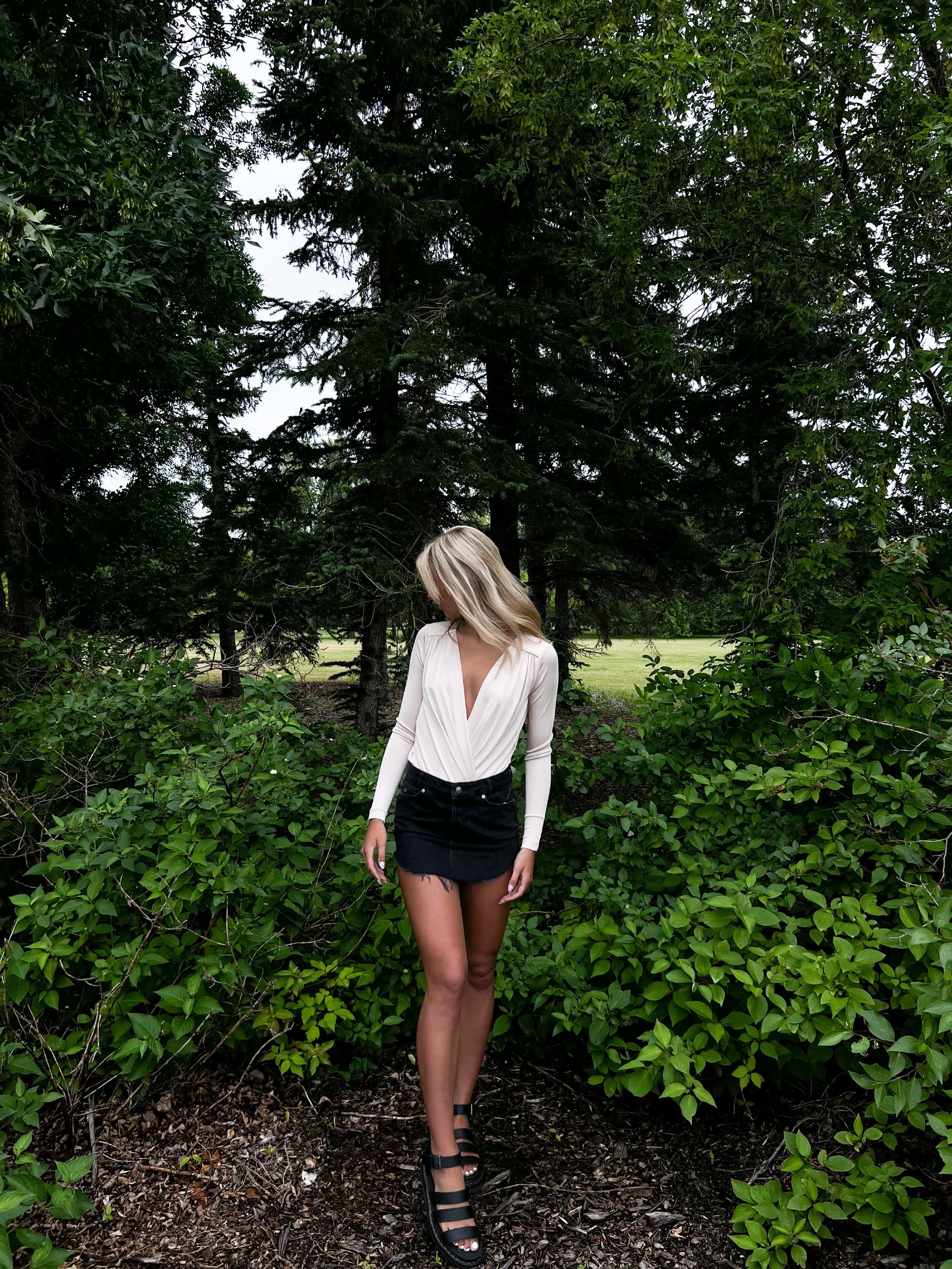 Free People Turnt Bodysuit – A form-fitting bodysuit with a high neckline, sleeveless design, and smooth fabric, Ocean Pearl