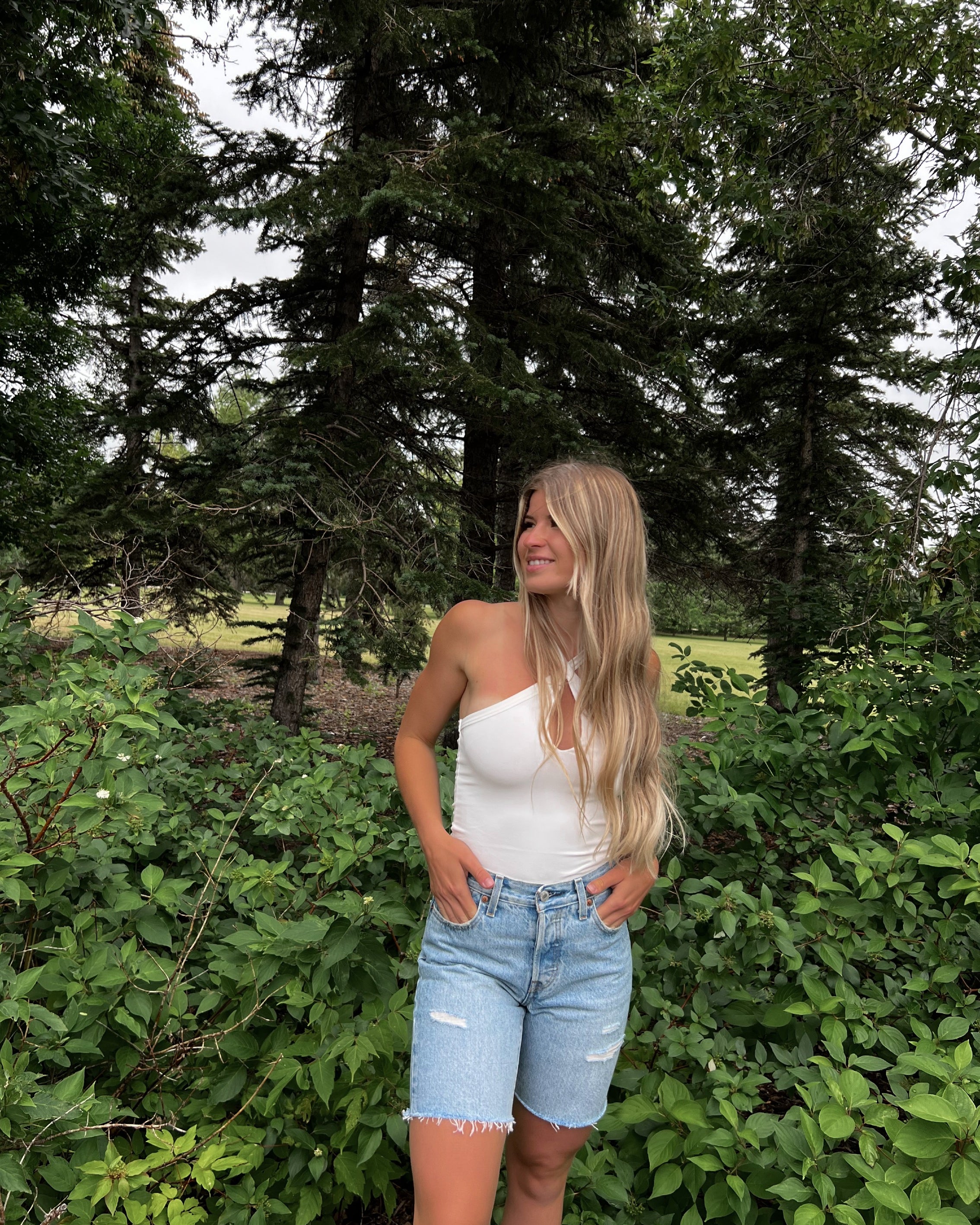 Free People Cross My Heart Duo Bodysuit – A fitted bodysuit with a unique crisscross design, White