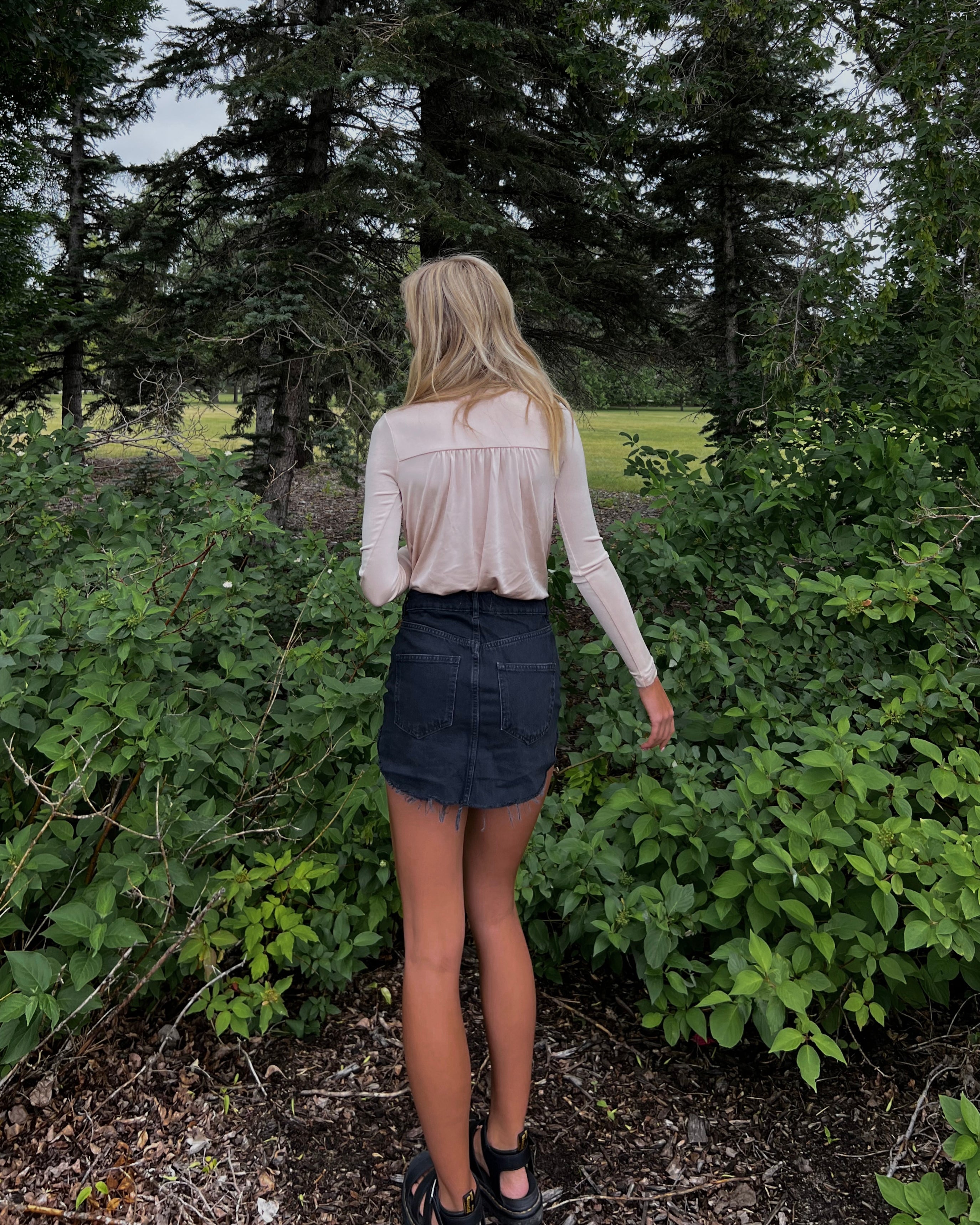 Free People Turnt Bodysuit – A form-fitting bodysuit with a high neckline, sleeveless design, and smooth fabric, Ocean Pearl