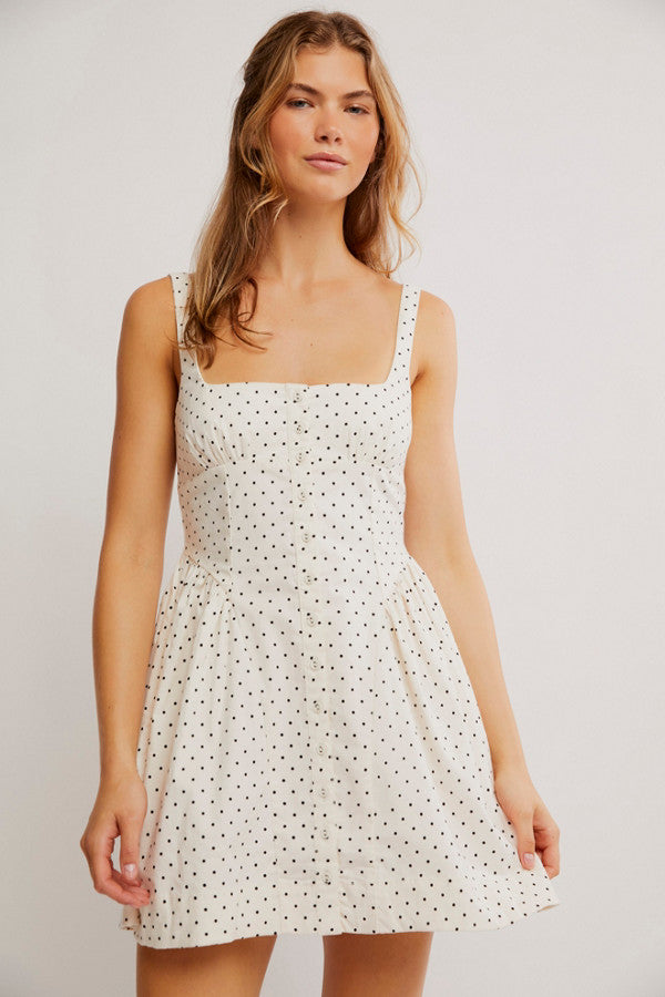 Free People Printed Astrid Mini Dress with a corset-style bodice, gathered bust and hip details, front buttons, and a vintage-inspired print, Ivory Polka-Dot