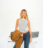 Free People Mia Tank with a high neckline, fitted ribbed knit fabric, and seamless stretch design, Black/White Stripe