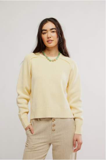 Free People Street Pullover with a relaxed fit, dropped shoulders, and soft knit fabric, featuring a crew neckline, Banana Cream