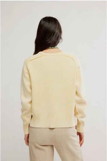 Free People Street Pullover with a relaxed fit, dropped shoulders, and soft knit fabric, featuring a crew neckline, Banana Cream