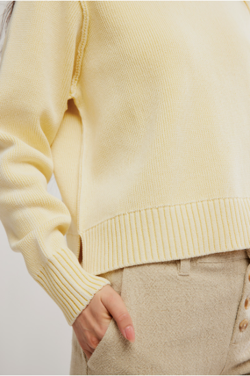 Free People Street Pullover with a relaxed fit, dropped shoulders, and soft knit fabric, featuring a crew neckline, Banana Cream