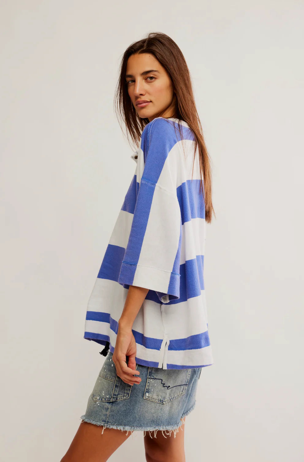 Free People Wonderful Tee featuring a relaxed, oversized fit with a deep V-neck and short sleeves. Made from soft, lightweight fabric, this casual tee offers a comfortable, laid-back style, perfect for everyday wear, Blue Combo
