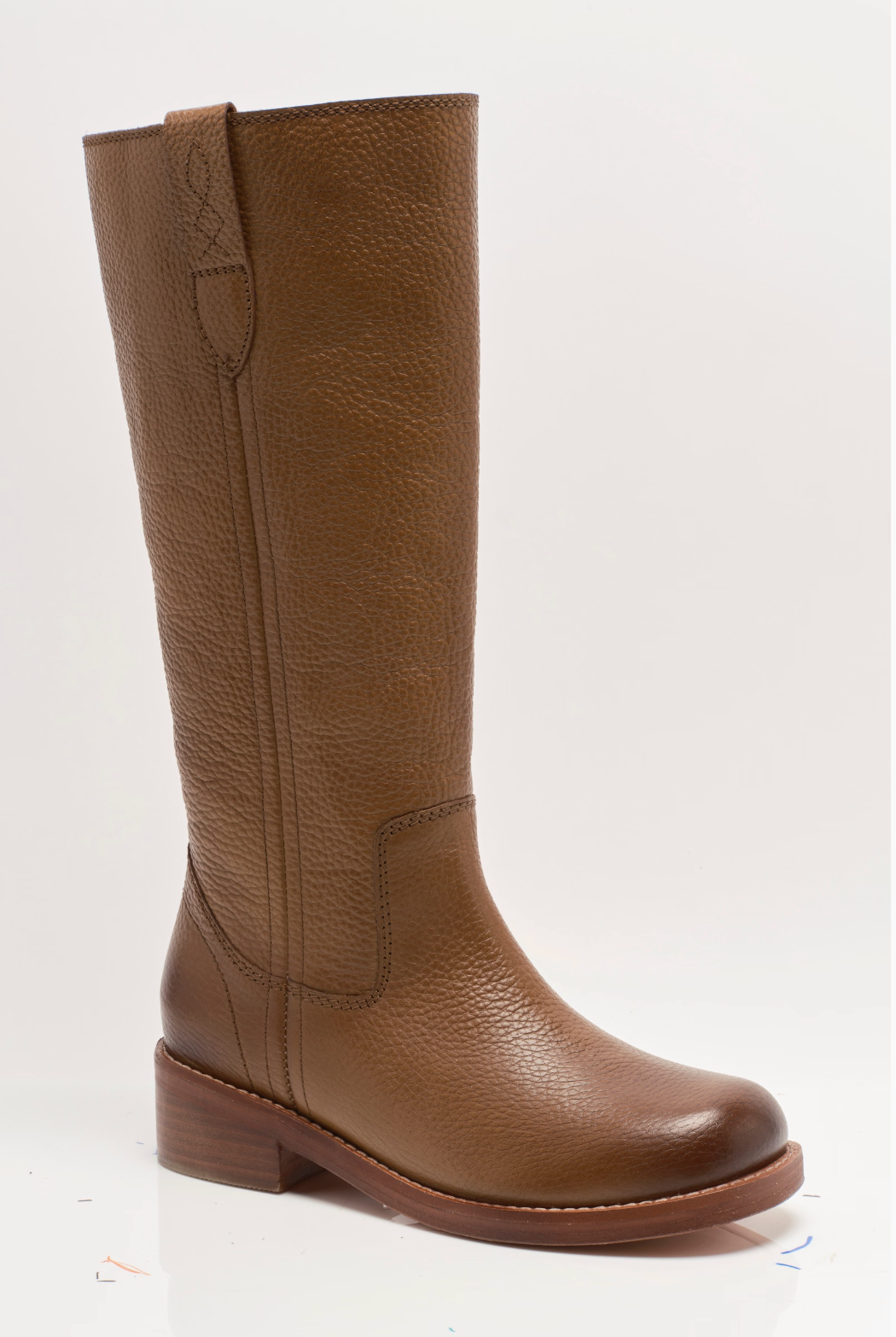 Free People Blaze Pull-On Boots featuring a tall silhouette, square toe, and stacked leather heel with distressed details, Toast Leather