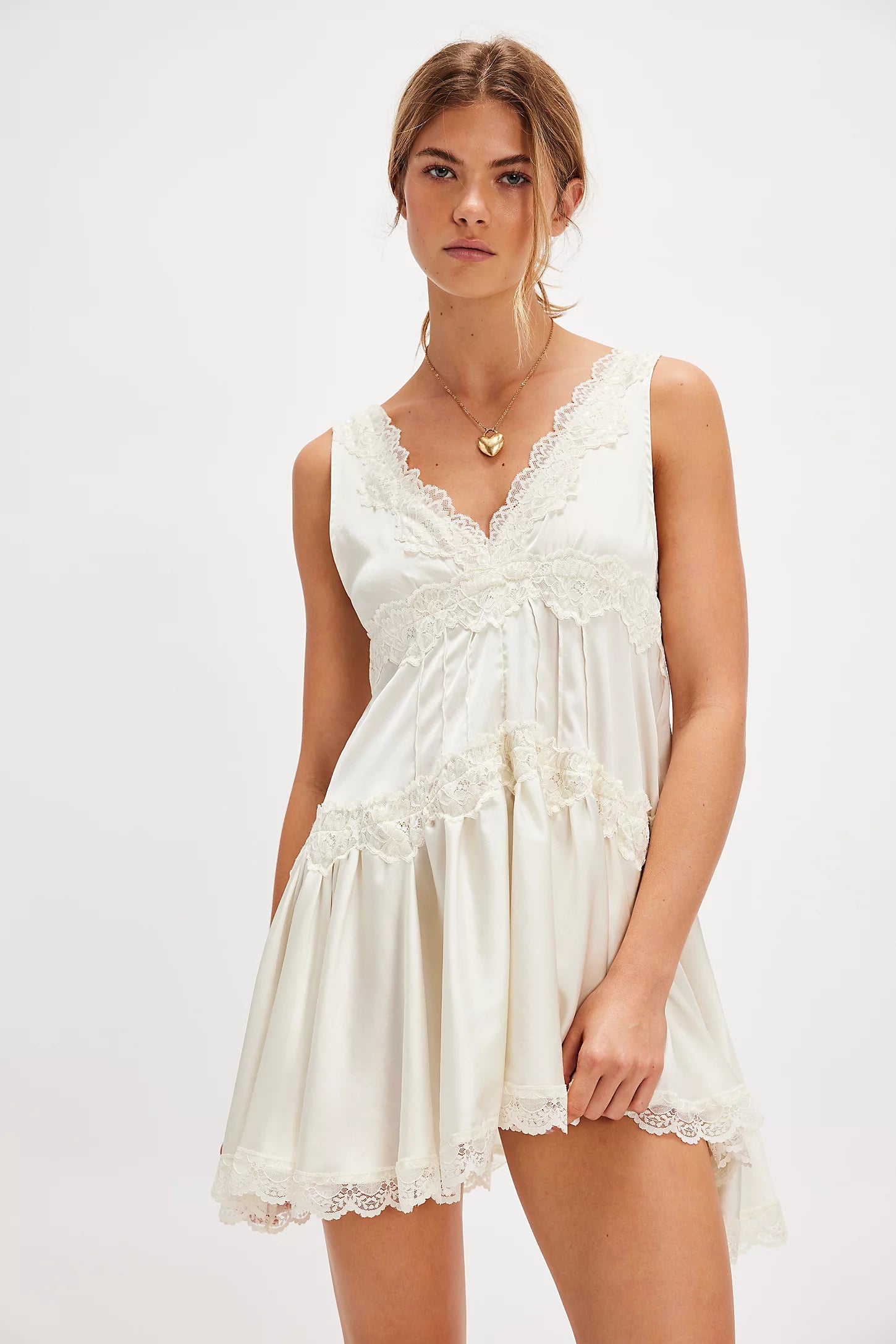 Free People In This Groove Mini Slip Dress – a silky mini slip dress with a plunging neckline and flattering A-line silhouette, Tofu