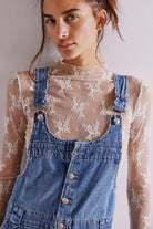 Free People Edie Denim Skirtall – a casual denim skirt with adjustable straps, front pockets, and a button-front design, Blue