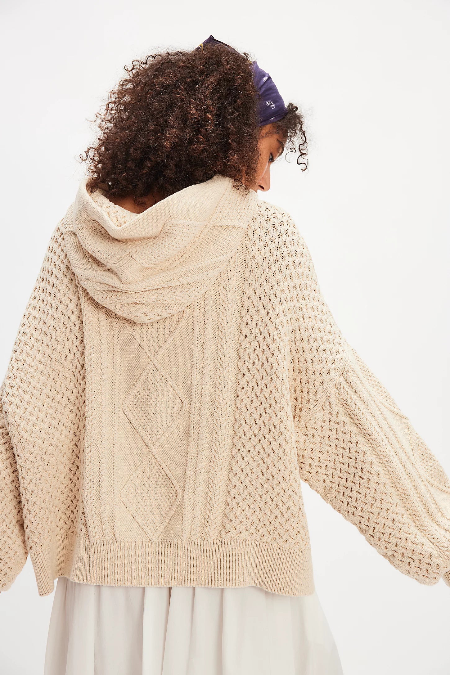 Free People Explorer Cable Hoodie featuring chunky cable knit texture, slouchy oversized fit, and cozy hood, Macadamia