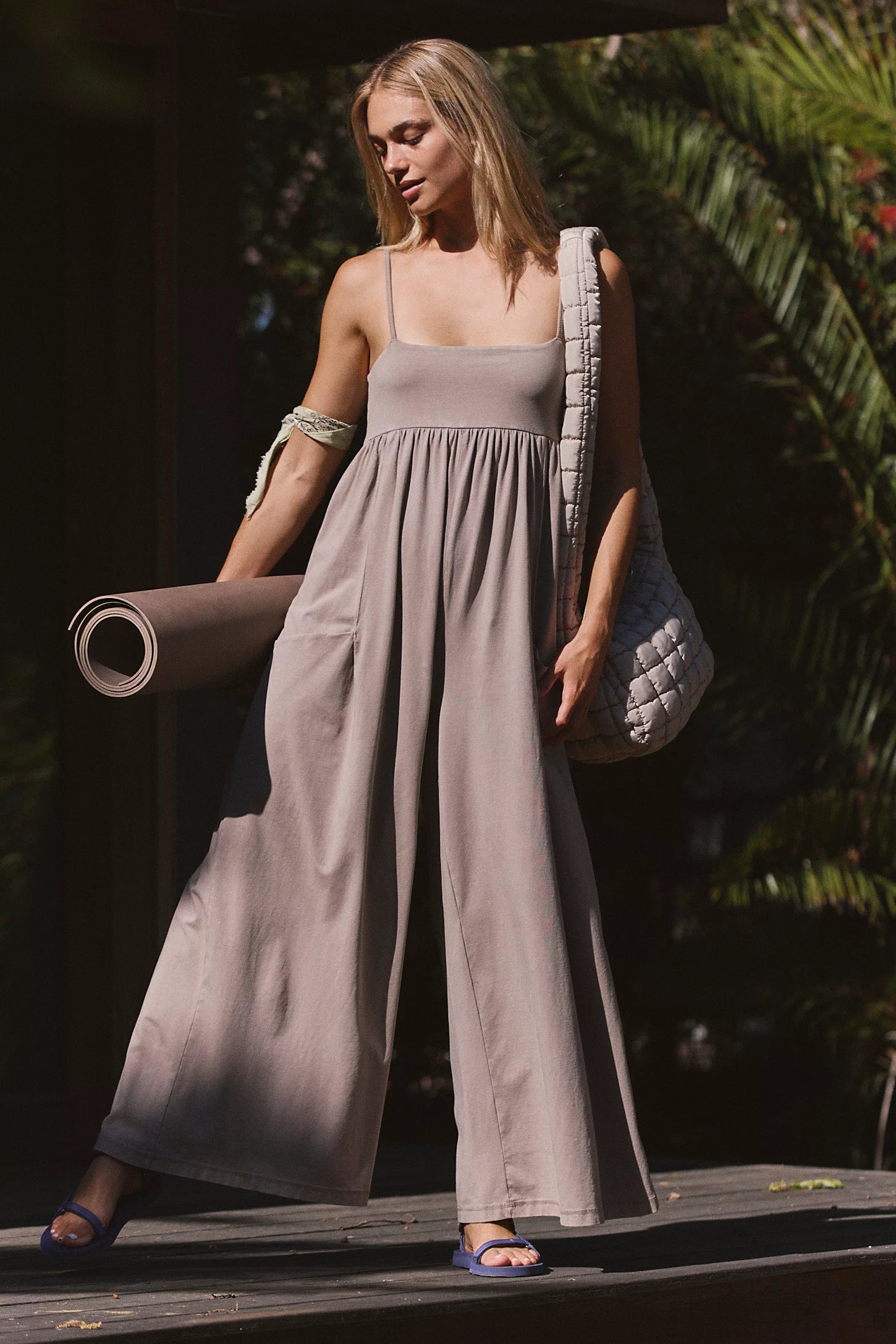 Free People Hot Shot Strappy Onesie, featuring soft cotton-blend fabric, simple shoulder straps, empire waist, and wide-leg slouchy fit, Hickory