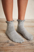 FP Movement classic ruffle socks, soft stretch knit with ribbed texture and delicate ruffle trim at the ankle, Heather Grey
