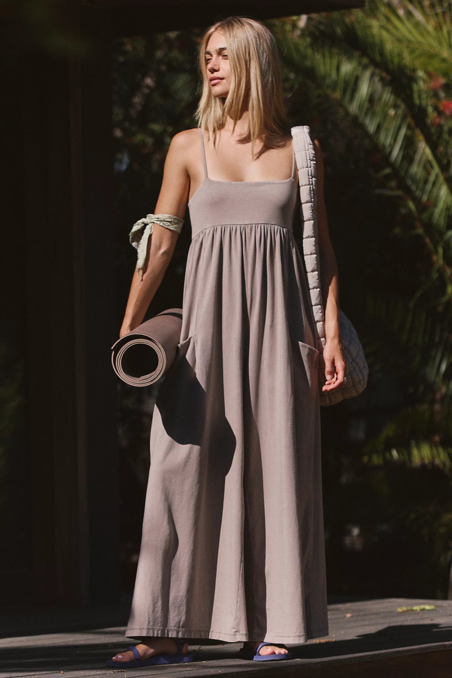 Free People Hot Shot Strappy Onesie, featuring soft cotton-blend fabric, simple shoulder straps, empire waist, and wide-leg slouchy fit, Hickory