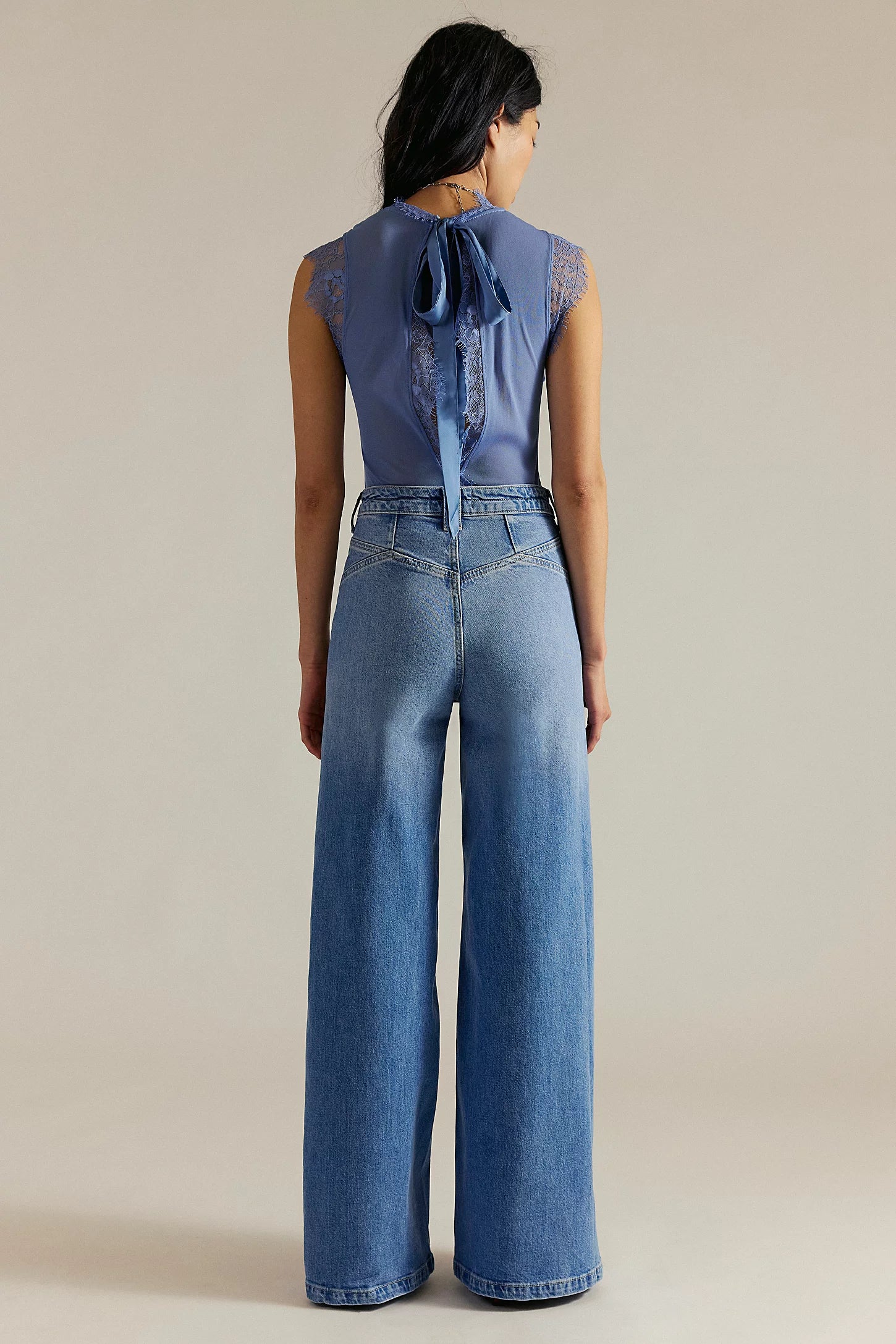 We The Free Kellee high-rise palazzo jeans in light-wash denim, featuring a fitted waist, wide-leg silhouette, Plaza Blue